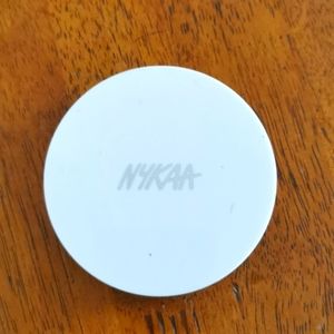 Powder compact